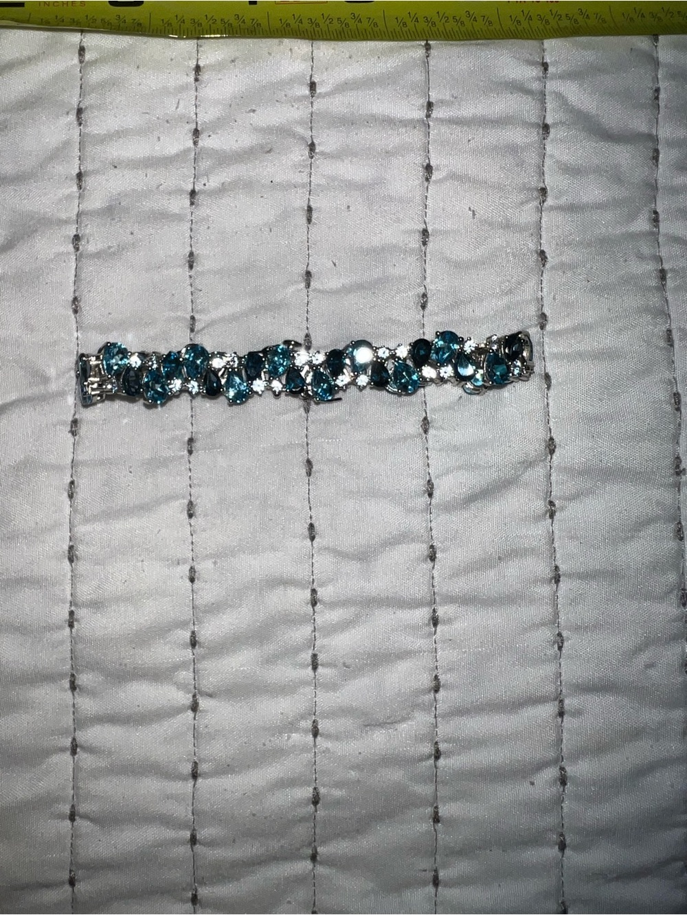 Sterling Silver Bracelet with Blue Topaz, Sapphire, & Diamond.